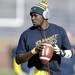 Michigan quarterback Devin Gardner warms up during the final game of the season against Iowa on Saturday morning. Melanie Maxwell I AnnArbor.com